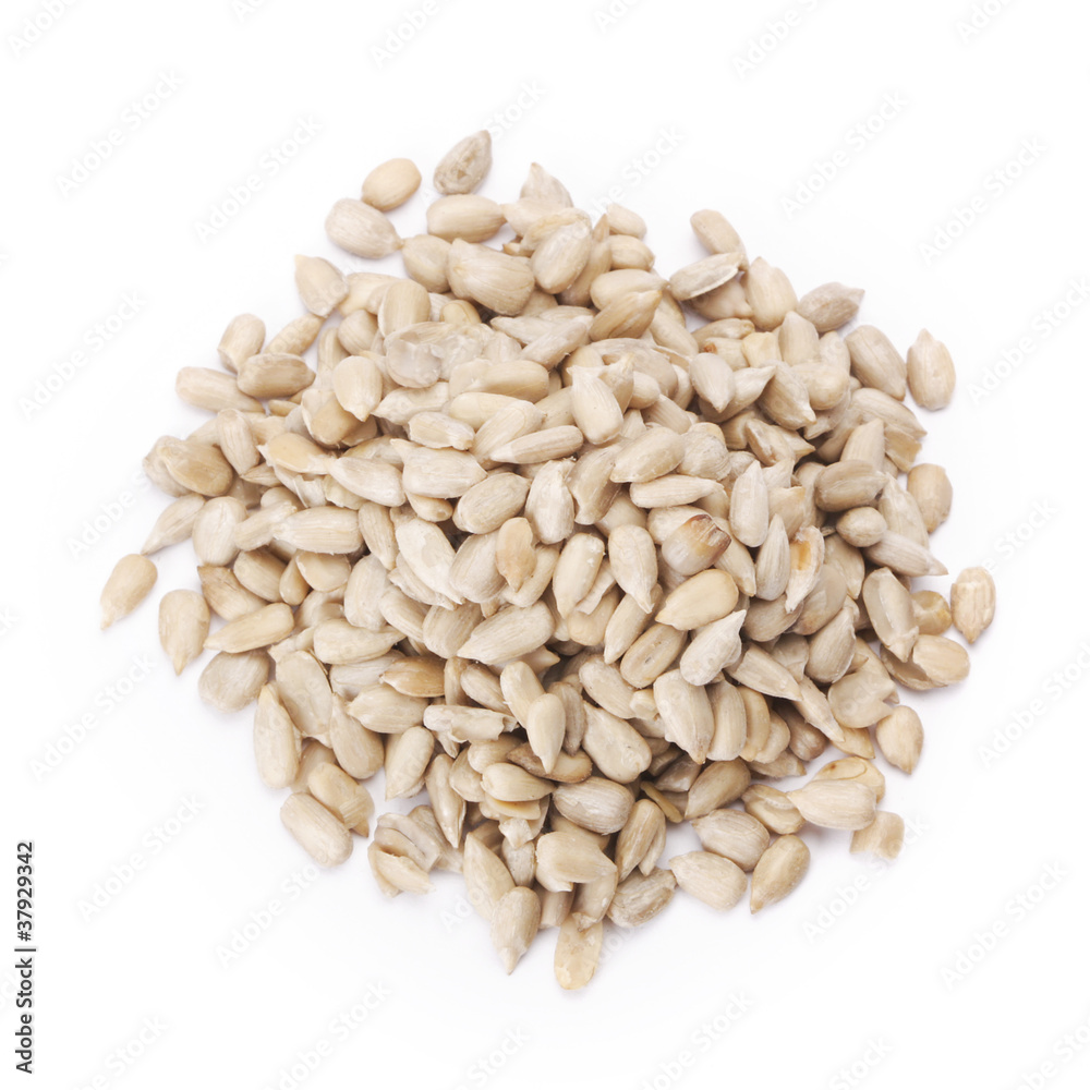 Healthy sun-flower seeds on a white background