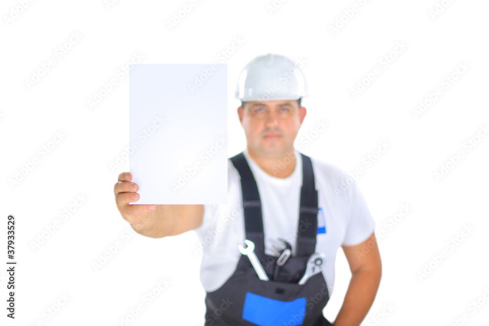 Confident worker presenting empty board and making ok sing Confident worker presenting empty board and making ok sing