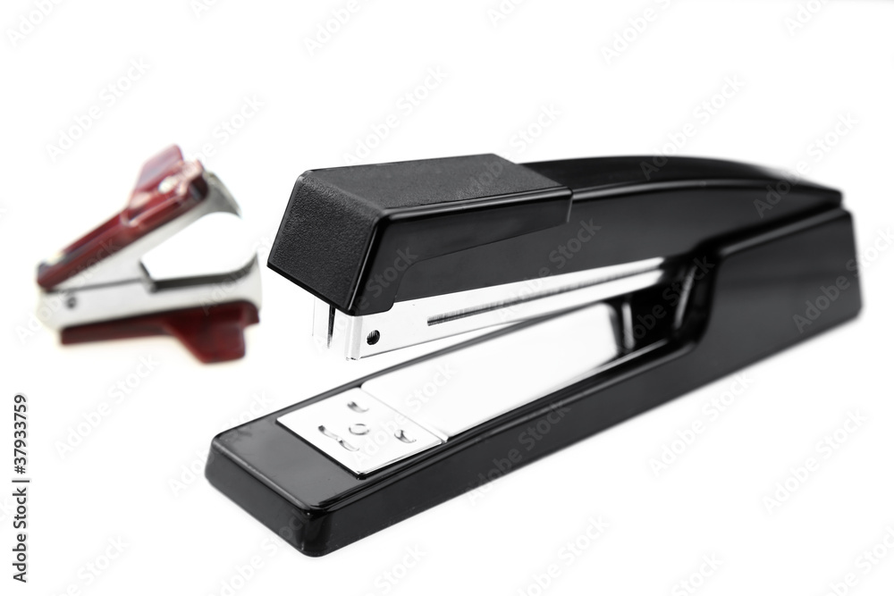 Stapler and staple remover on white background Stapler and staple remover on white background