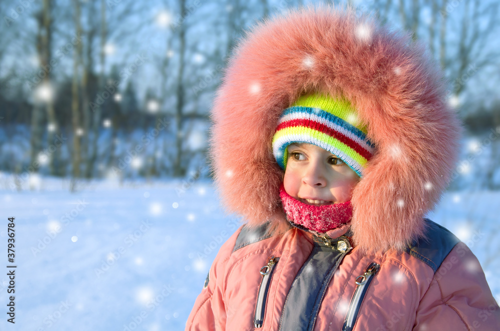 Little funny girl walking a winter sunny day. Little funny girl walking a winter sunny day.
