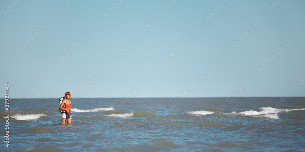 happy young woman surrounded by water seaside happy young woman surrounded by water seaside
