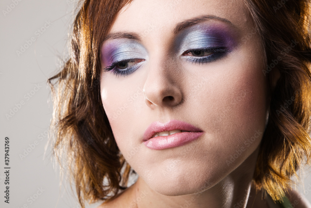 Fototapeta premium Face portrait of a beautiful young woman