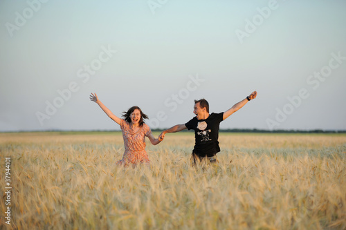 Young couple in wheat field