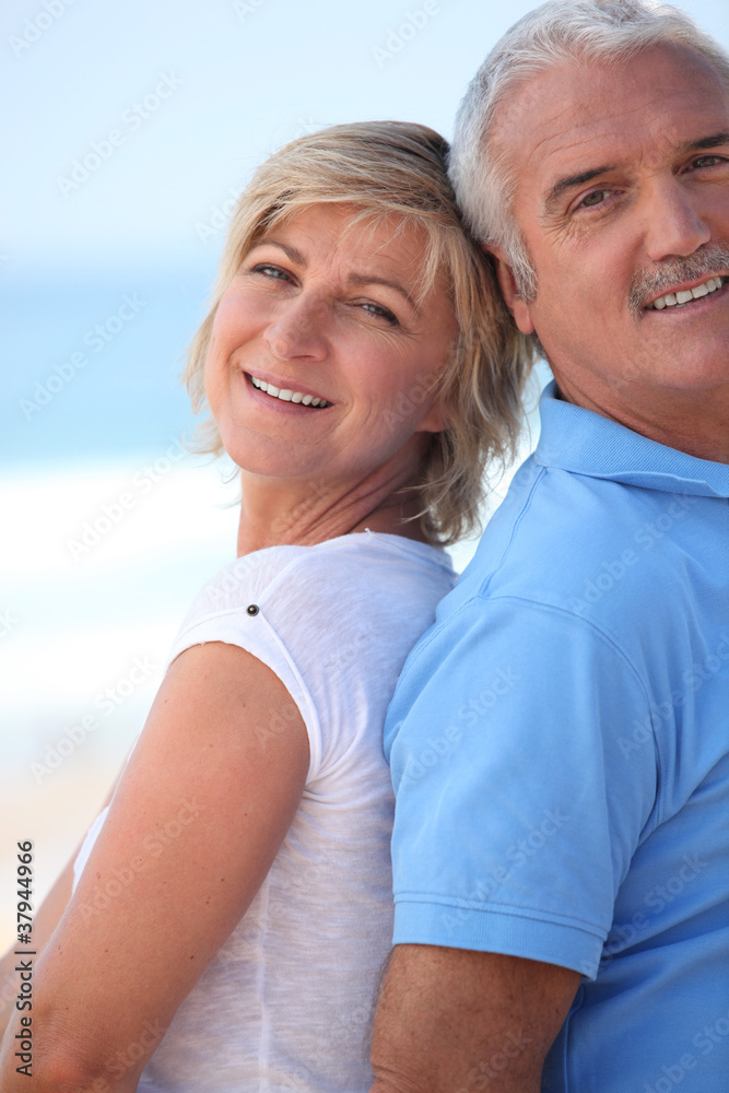A mature couple at the beach.