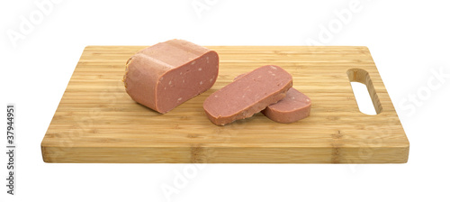 Φωτογραφία Tinned luncheon meat on cutting board