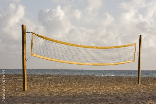 Beach volleyball playing court at sunrise or sunset