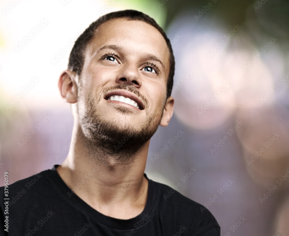 Fototapeta premium young man looking up