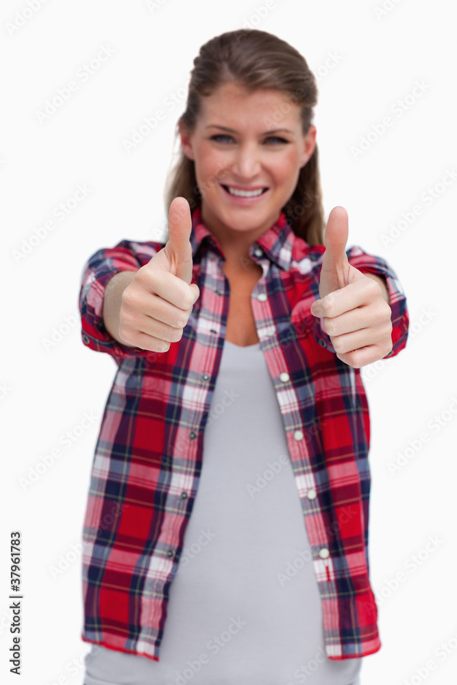 Portrait of a blissful woman with the thumbs up Portrait of a blissful woman with the thumbs up