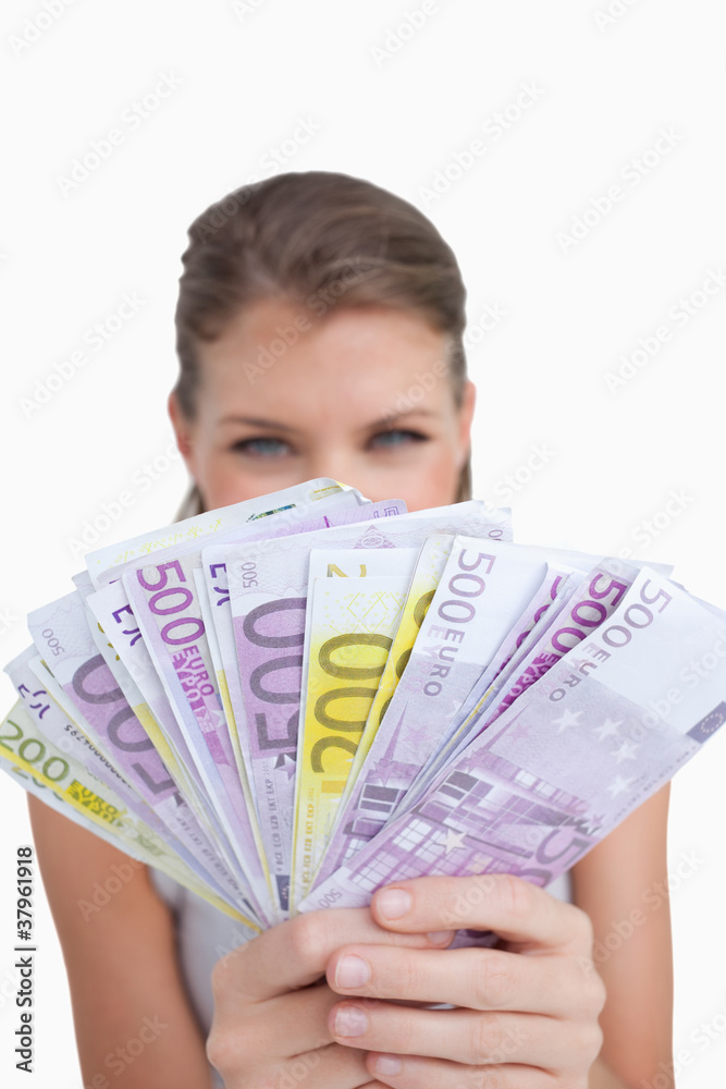 Portrait of a cute woman showing bank notes Portrait of a cute woman showing bank notes