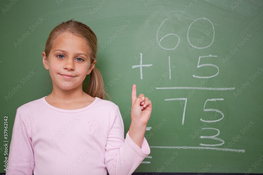Cute schoolgirl raising her hand Cute schoolgirl raising her hand