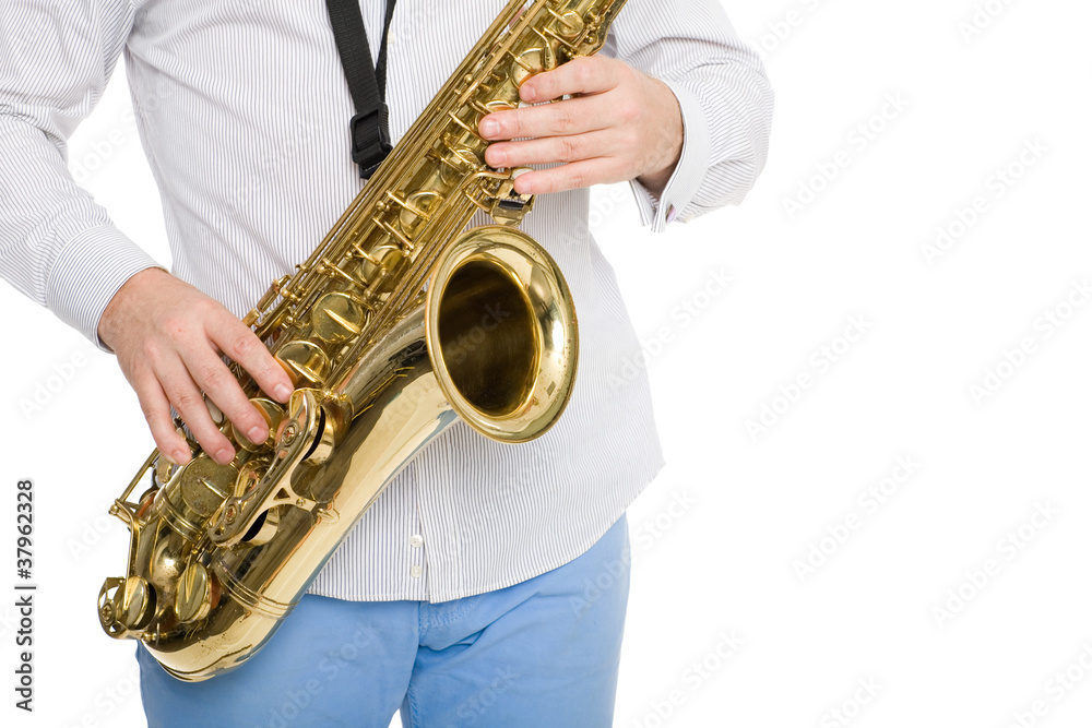 Obraz premium Hands musician playing the saxophone