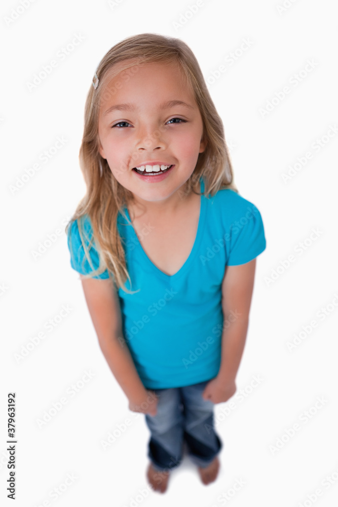 Portrait of a cute girl smiling at the camera Portrait of a cute girl smiling at the camera