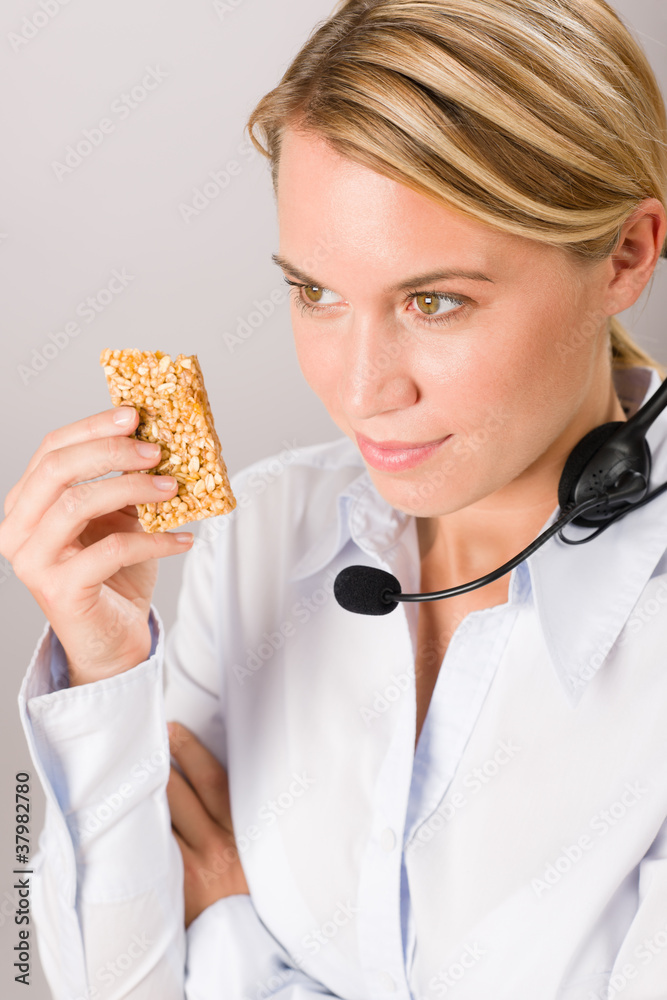 Customer service woman operator have break snack Customer service woman operator have break snack