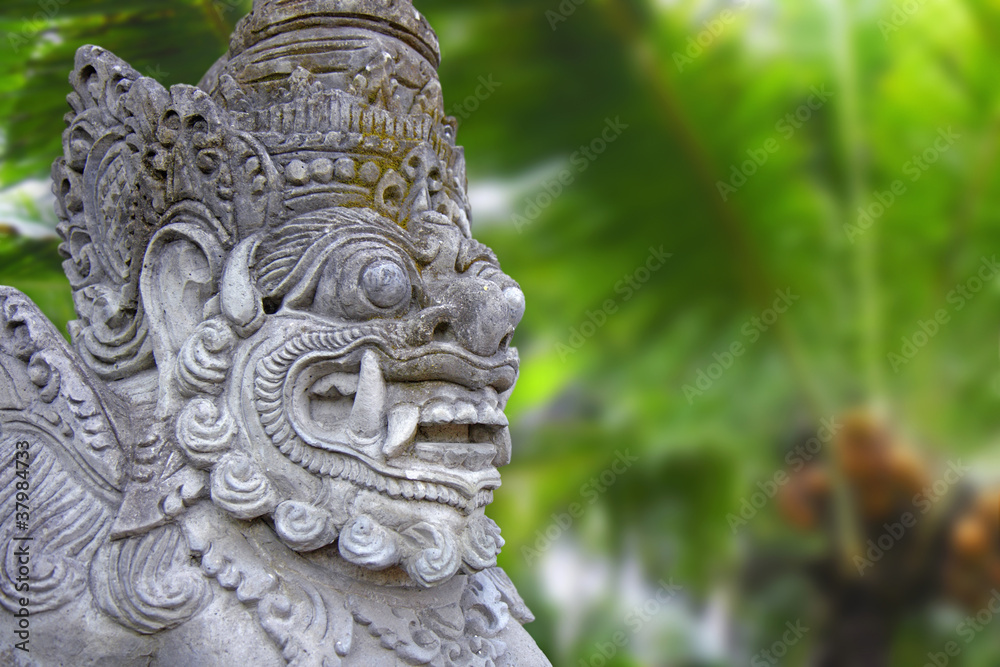Decorated statue of traditional hindu god, Bali, Indonesia Decorated statue of traditional hindu god, Bali, Indonesia