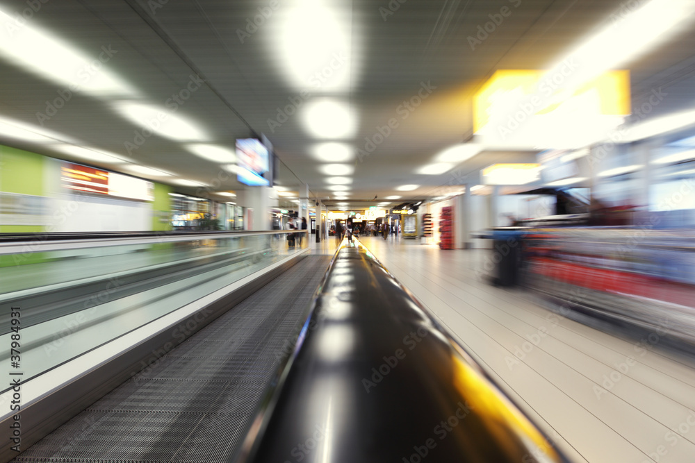 moving escalator in airport moving escalator in airport