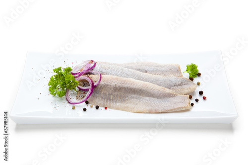 Konstfotografi Marinated herring fillets with vegetables