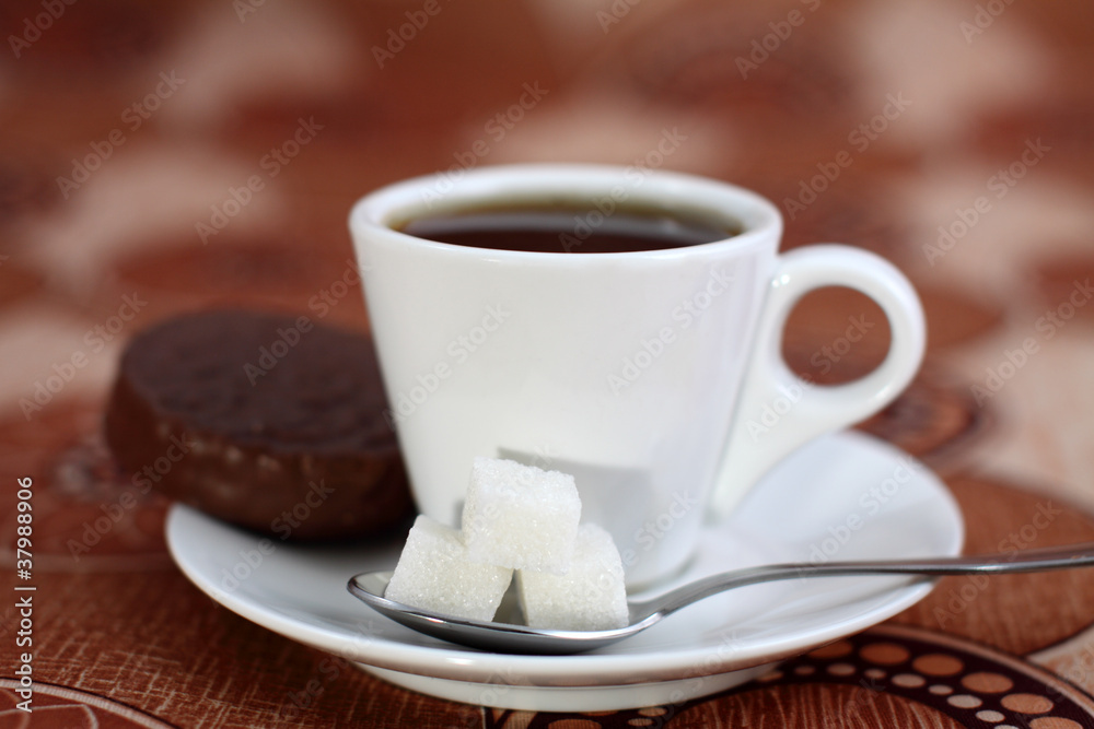 Coffee cup from coffee, cookies, a spoon and sugar Coffee cup from coffee, cookies, a spoon and sugar