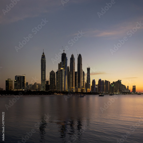 View at modern skyscrapers in Dubai Marina at sunset  UAE