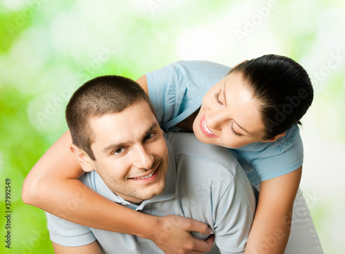 Portrait of happy couple, outdoors