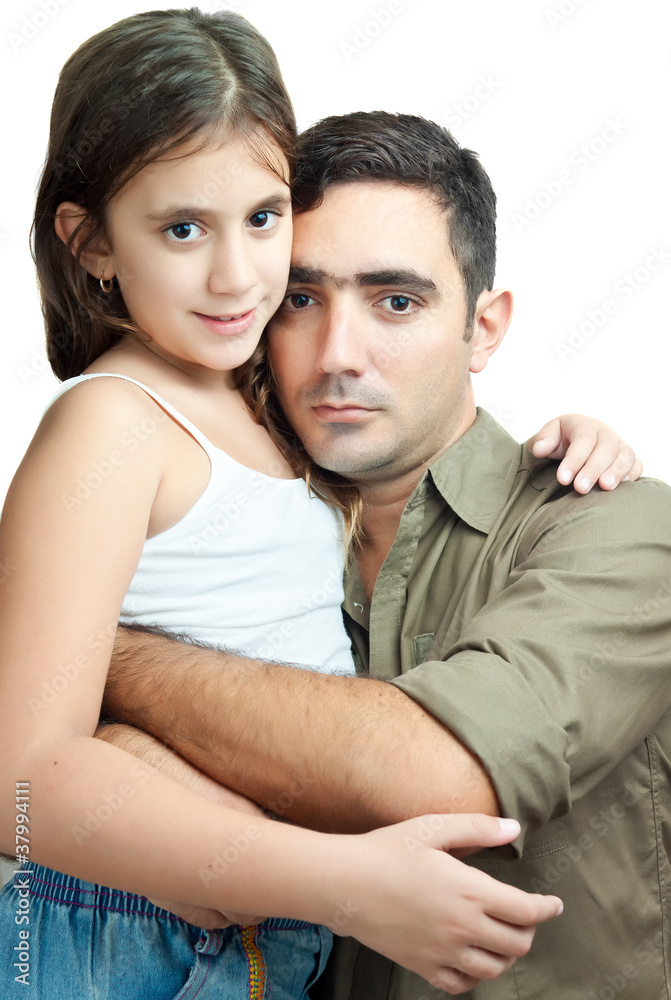 Latin father hugging his daughter isolated on white Latin father hugging his daughter isolated on white