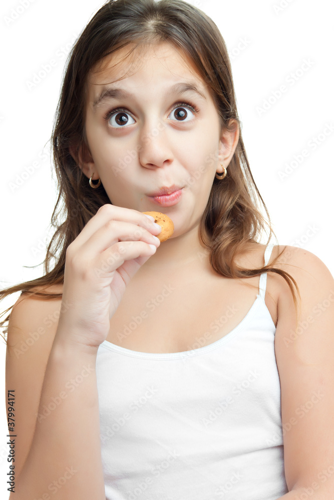 Latin girl eating chocolate chips cookies isolated on white