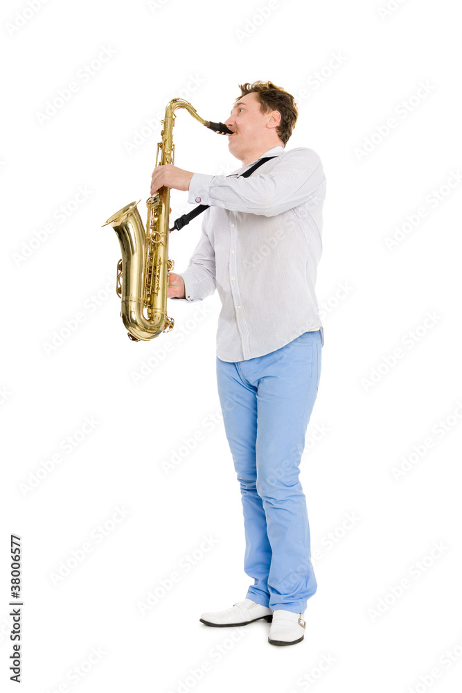 Naklejka premium Young musician plays the saxophone