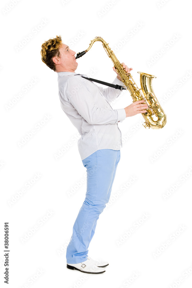 Fototapeta premium Young musician plays the saxophone