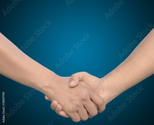 hand in Hand or handshake on blue background