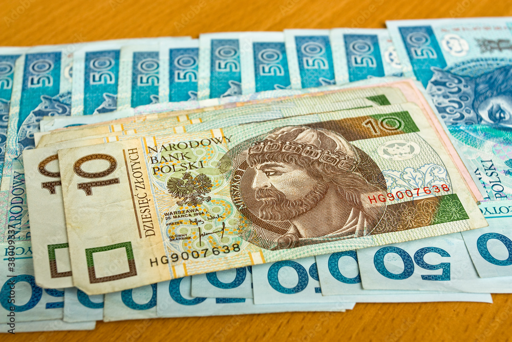 polish money - zloty, banknotes on the table