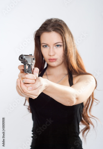 Girl aiming a gun