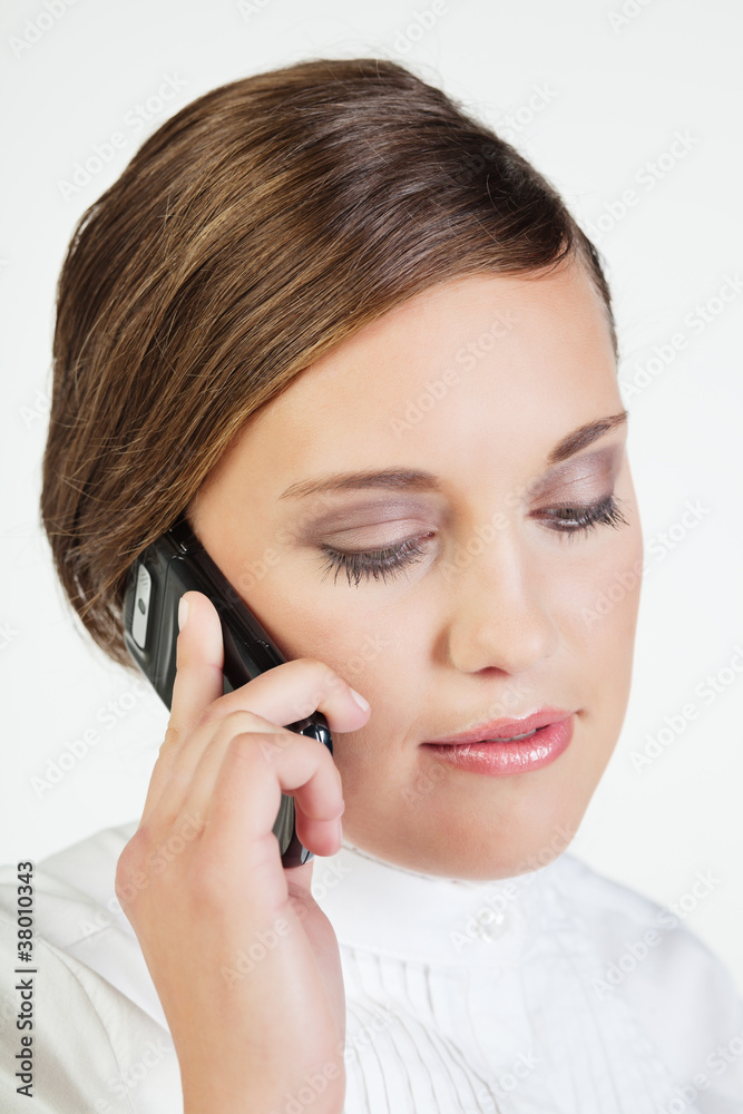 Young businesswoman with phone