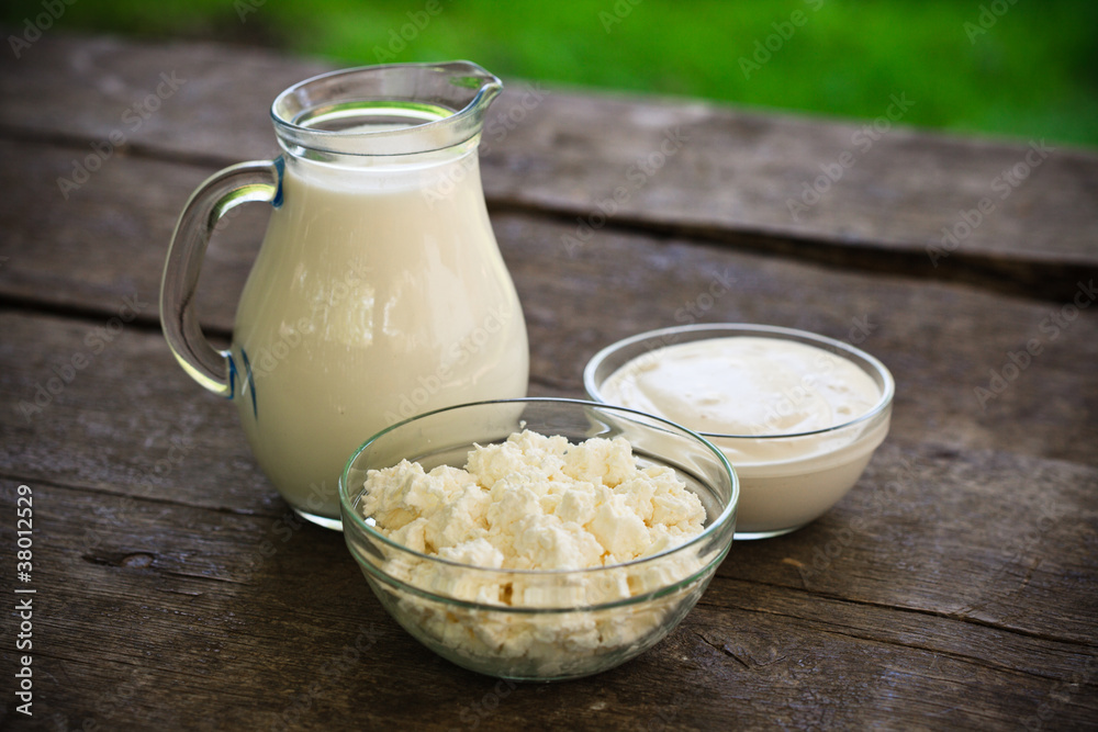 Dairy products on wooden table Dairy products on wooden table