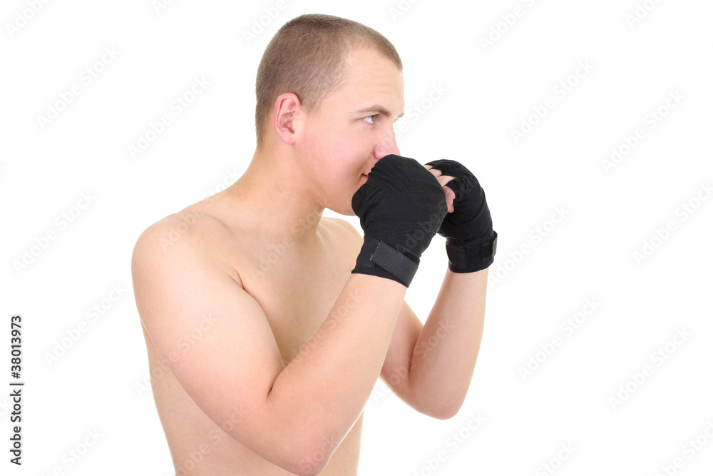 young boxer in a defensive stance isolated over white young boxer in a defensive stance isolated over white