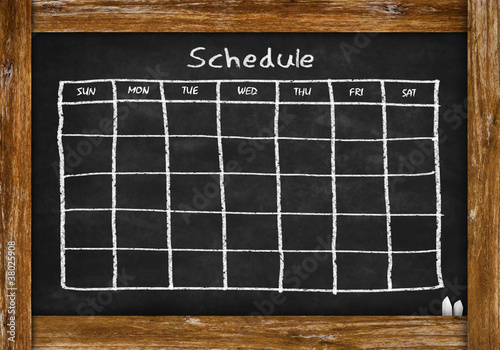 chalkboard with schedule and calendar