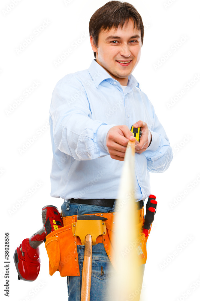 Construction worker holding ruler that going into the distance Construction worker holding ruler that going into the distance