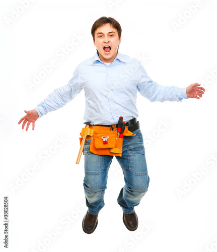 Shouting construction worker jumping