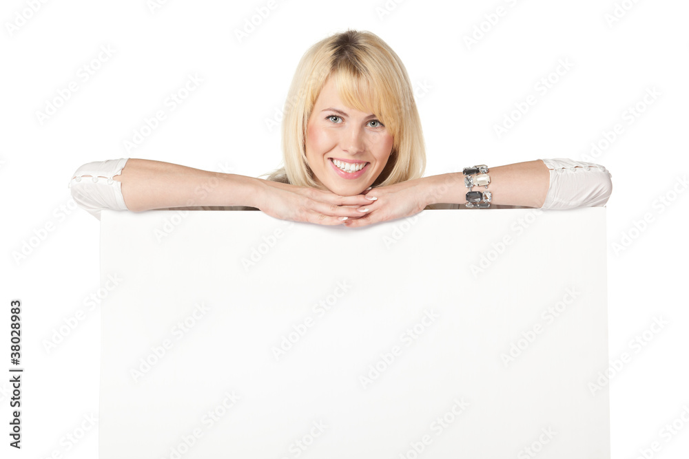 Businesswoman standing behind, leaning on white blank billboard Businesswoman standing behind, leaning on white blank billboard
