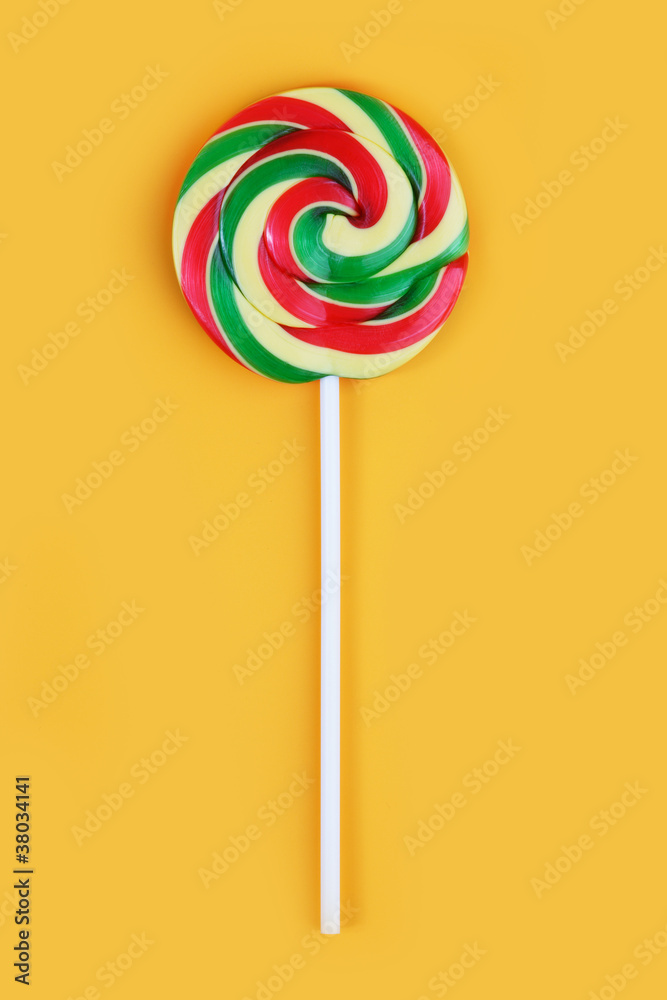Sweet colorful candy with a stick Sweet colorful candy with a stick