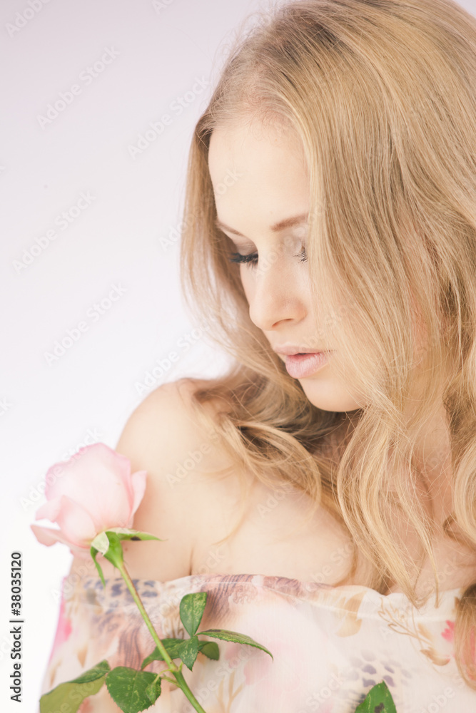 Romantic girl with pink rose