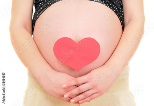 Wallpaper Mural closeup of a pregnant woman holding red heart Torontodigital.ca