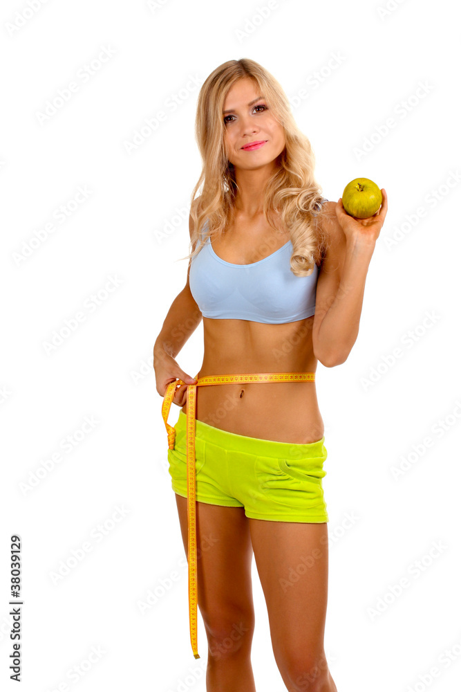 Beautiful fitness girl and measuring tape isolated on white Beautiful fitness girl and measuring tape isolated on white