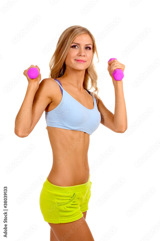 Beautiful fitness girl with dumbbells isolated on white Beautiful fitness girl with dumbbells isolated on white