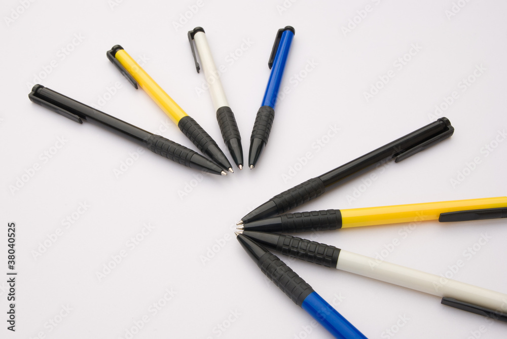 different color ball pens on white different color ball pens on white