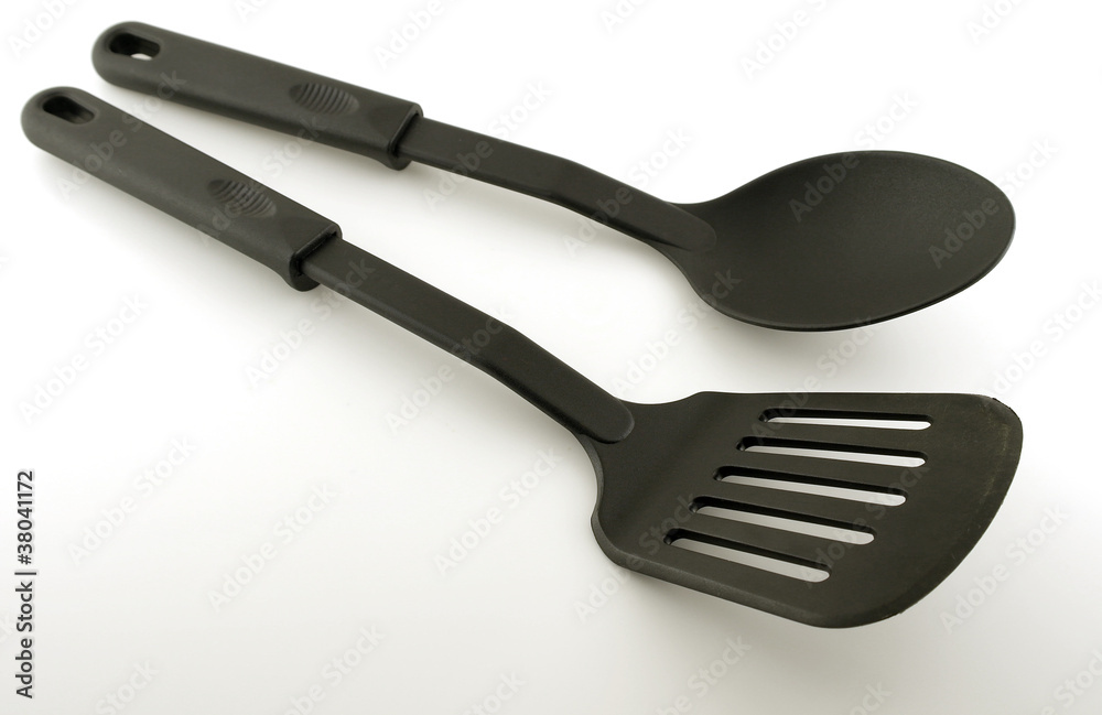 Black plastic kitchenware over white Black plastic kitchenware over white