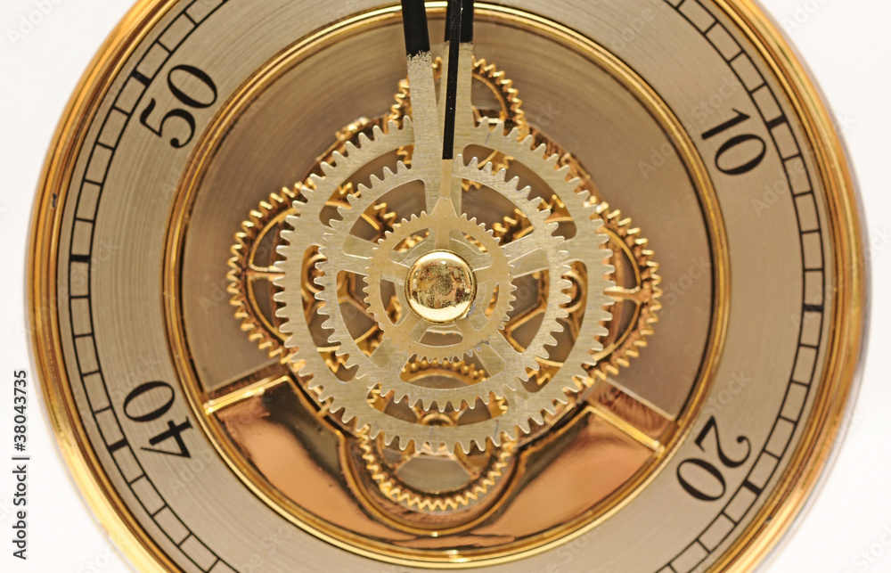 closeup golden clock with gears