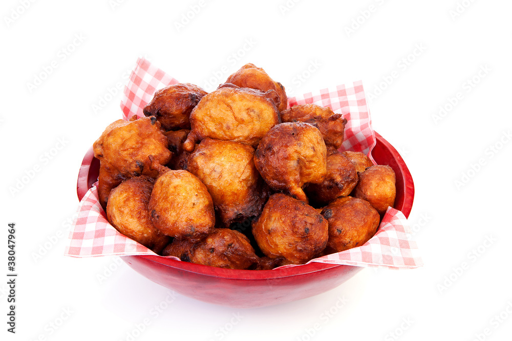 Bowl with Pile of Dutch donut also known as oliebollen Bowl with Pile of Dutch donut also known as oliebollen