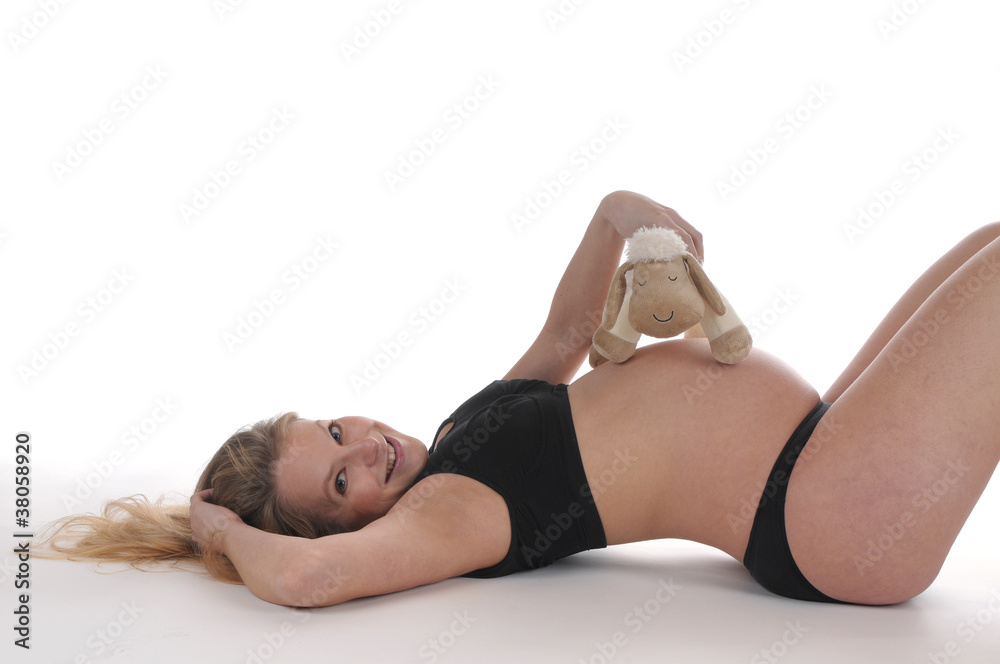 Obraz premium schwanger frau mit kuscheltier
