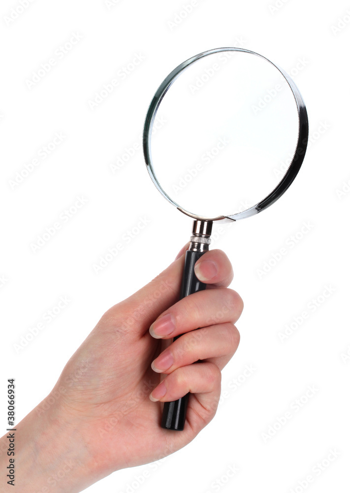 Magnifying glass in hand isolated on white Magnifying glass in hand isolated on white