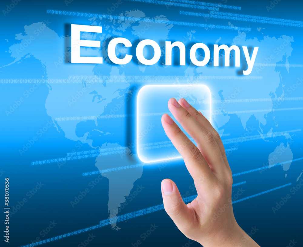 hand pushing economy button on a touch screen interface hand pushing economy button on a touch screen interface