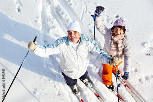 Cheerful skiers